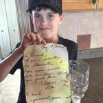Dallas Goreham, 11, found a letter in a bottle on a Nova Scotia beach. It had been written by an 80-year-old woman visiting Gloucester 18 years ago. 